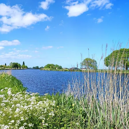 At The Amstel River With 2br 2ba And Garden