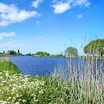 At The Amstel River With 2br 2ba And Garden